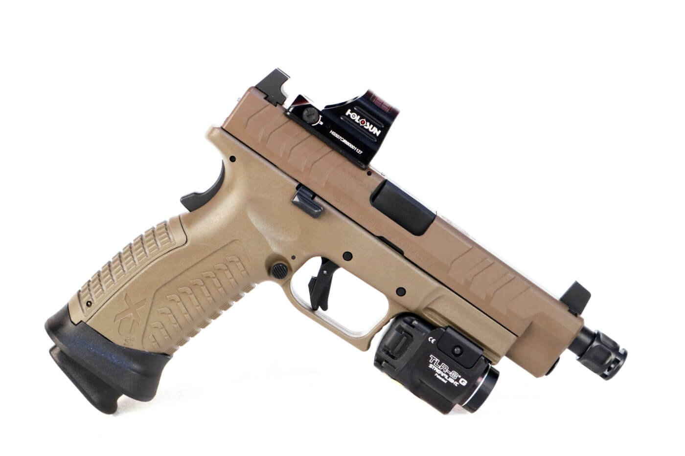 Griffin Micro Carry Comp mounted on Springfield Armory XD-M Elite Tactical This Springfield XD-M Elite is equipped with a red dot sight and tactical flashlight in addition to the o-ring secured compensator. Reflex optics - like a muzzle comp - help to make the pistol easier to shoot. The author noticed reduced muzzle flip on the shooting range and a reduced split time between shorts. In this gear review, he used a variety of 9mm loads including 115 grain, 124 grain and 147 grain bullets.