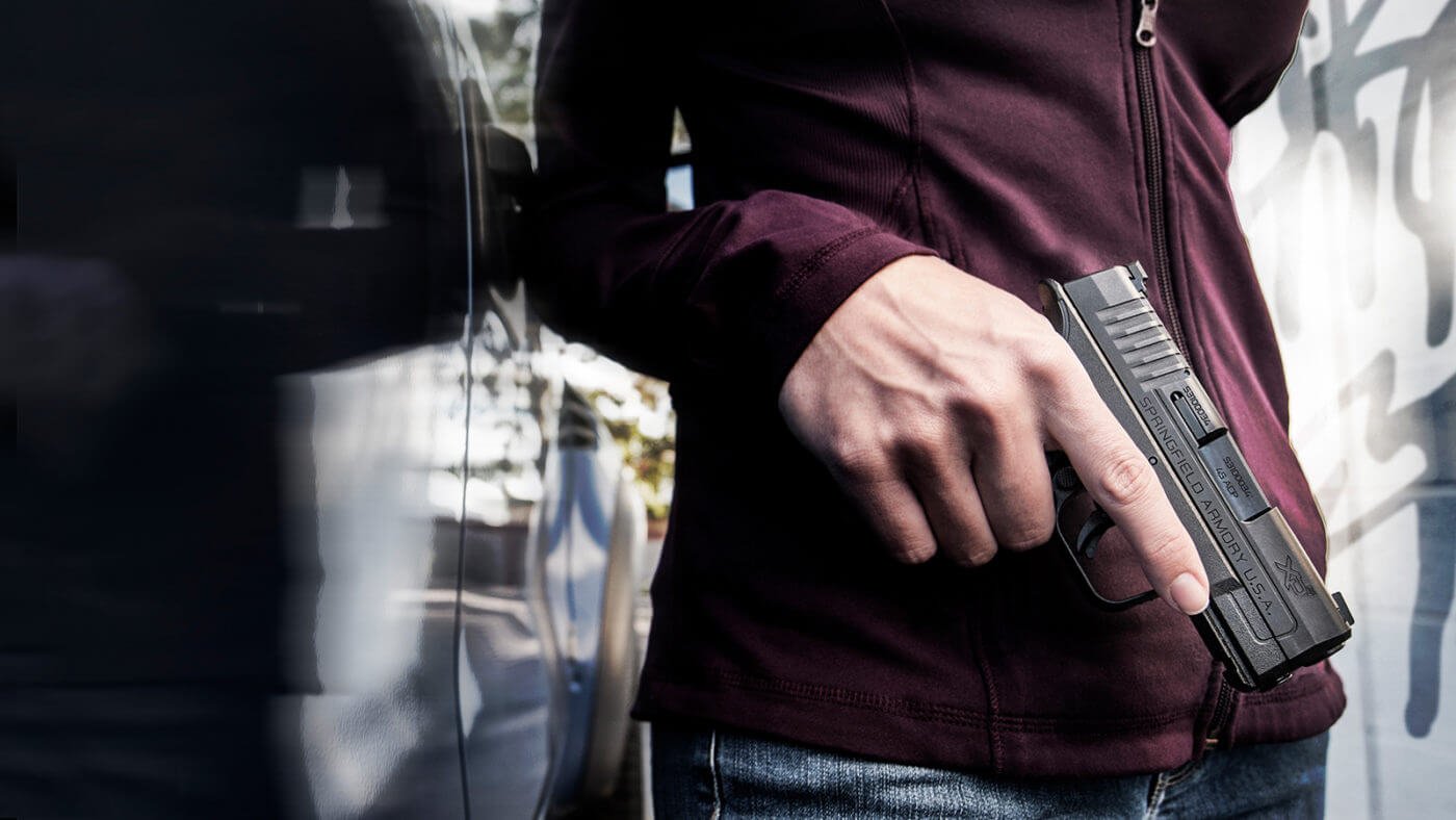 As this woman shows, the Springfield Armory XD makes an excellent pistol for the first time gun buyer.